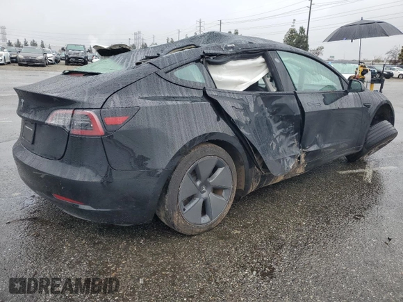 2023 Tesla Model 3 with VIN 5YJ3E1EA2PF671865, listed as a Copart auction lot 45220285 with 29,614 mi miles and Salvage title. Bid and sale history available at DreamBid. Image 3.
