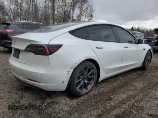 2021 Tesla Model 3 Standard Range Plus z VIN 5YJ3E1EA0MF906162, wystawiony jako Copart lot #53004925 z przebiegiem 149 163 mil mil oraz Tytuł czysty. Historia ofert i sprzedaży dostępna na DreamBid. Obrazek 3.