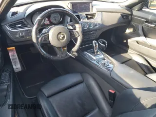 2011 BMW Z4 sDrive35is with VIN WBALM1C58BE393909, listed as a Copart auction lot 89218305 with 112,502 mi miles and Salvage Title. Bid and sale history available at carsss.com. Image 8.