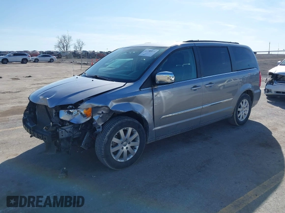 2013 Chrysler Town & Country Touring-L with VIN 2C4RC1CG6DR650928, listed as a IAAI auction lot 41740639 with 198,678 mi miles. Bid and sale history available at carsss.com. Image 2.