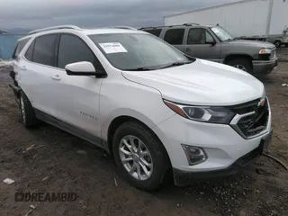 2018 Chevrolet Equinox LT z VIN 2GNAXSEV8J6122590, wystawiony jako IAAI lot #39579571 z przebiegiem 45 715 mil mil oraz . Historia ofert i sprzedaży dostępna na DreamBid. Obrazek 1.