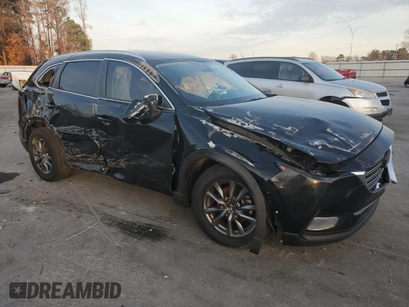 2021 Mazda CX-9 Sport with VIN JM3TCABYXM0515467, listed as a Copart auction lot 84933074 with Not provided miles and Salvage title. Bid and sale history available at DreamBid. Image 4.