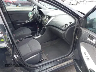 2013 Hyundai Accent GL with VIN KMHCT5AEXDU092644, listed as a IAAI auction lot 42078339 with 134,288 mi miles. Bid and sale history available at carsss.com. Image 5.
