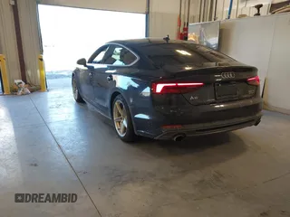 2018 Audi A5 Sportback Premium Plus with VIN WAUENCF52JA133055, listed as a IAAI auction lot 41644106 with 71,558 mi miles. Bid and sale history available at carsss.com. Image 3.