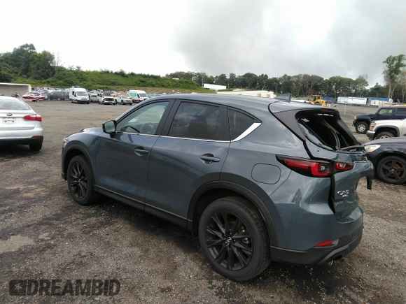 2023 Mazda CX-5 2.5 S Carbon Edition with VIN JM3KFBCM1P0209900, listed as a IAAI auction lot 37342913 with 3,853 mi miles. Bid and sale history available at carsss.com. Image 3.