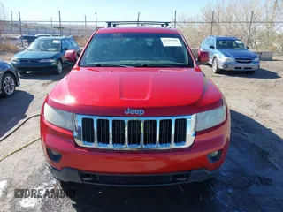 2011 Jeep Grand Cherokee 70th Anniversary with VIN 1J4RR4GT2BC703163, listed as a IAAI auction lot 41763149 with 184,523 mi miles. Bid and sale history available at carsss.com. Image 12.