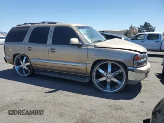 2000 GMC Yukon SLT with VIN 1GKEK13T2YJ131985, listed as a Copart auction lot 68952584 with 210,186 mi miles and Salvage Title. Bid and sale history available at carsss.com. Image 4.