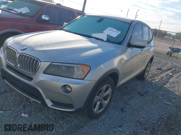 2011 BMW X3 28i with VIN 5UXWX5C50BL703124, listed as a IAAI auction lot 41563175 with 216,317 mi miles. Bid and sale history available at carsss.com. Image 2.