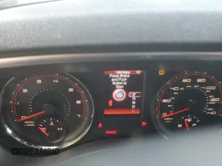 2013 Dodge Charger SE with VIN 2C3CDXBG9DH512172, listed as a Copart auction lot 60943214 with 125,163 mi miles and Salvage Title. Bid and sale history available at DreamBid. Image 9.