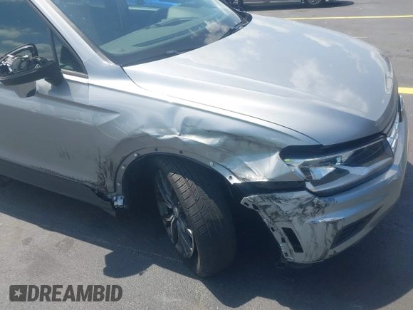 2021 Volkswagen Tiguan S with VIN 3VV1B7AX7MM117954, listed as a IAAI auction lot 42300223 with 45,587 mi miles and . Bid and sale history available at DreamBid. Image 6.