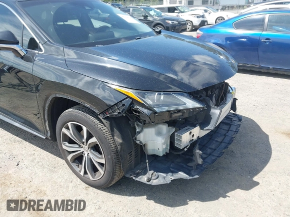 2016 Lexus RX 350 with VIN 2T2BZMCA9GC046531, listed as a IAAI auction lot 42704126 with 103,928 mi miles and . Bid and sale history available at DreamBid. Image 6.