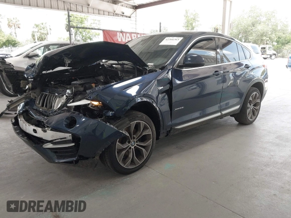 2015 BMW X4 xDrive28i with VIN 5UXXW3C51F0M87268, listed as a IAAI auction lot 42366363 with 143,285 mi miles and . Bid and sale history available at DreamBid. Image 18.