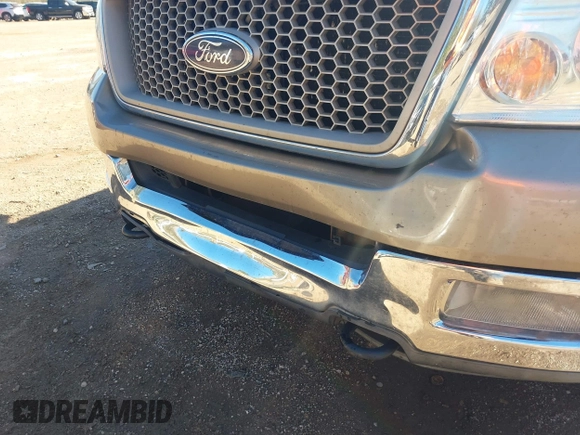 2004 Ford F-150 XLT with VIN 1FTPW14504KC17681, listed as a IAAI auction lot 41852362 with 201,674 mi miles. Bid and sale history available at carsss.com. Image 6.