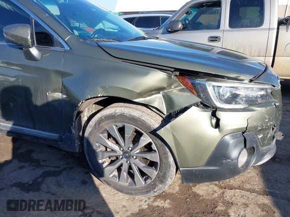 2019 Subaru Outback Touring with VIN 4S4BSATC9K3264541, listed as a IAAI auction lot 41312719 with 133,916 mi miles and . Bid and sale history available at DreamBid. Image 6.