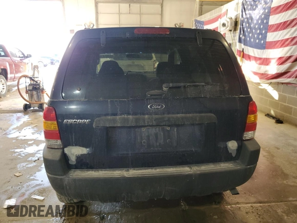 2004 Ford Escape XLS with VIN 1FMYU92154KA14600, listed as a Copart auction lot 83101474 with 305,444 mi miles and Salvage Title. Bid and sale history available at DreamBid. Image 6.