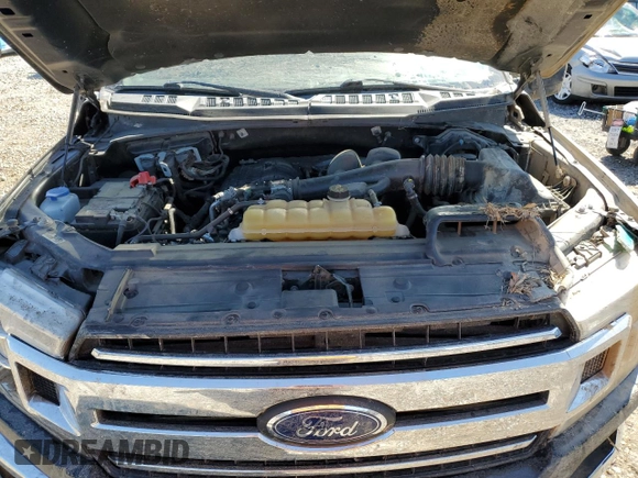 2020 Ford F-150 XL z VIN 1FTEW1EB4LFC29710, wystawiony jako Copart lot #52036025 z przebiegiem Nie podano mil oraz Szkoda całkowita • Salvage title. Historia ofert i sprzedaży dostępna na DreamBid. Obrazek 13.