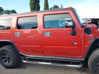 2003 Hummer H2 with VIN 5GRGN23U23H104200, listed as a IAAI auction lot 41687769 with 1 mi miles. Bid and sale history available at carsss.com. Image 13.
