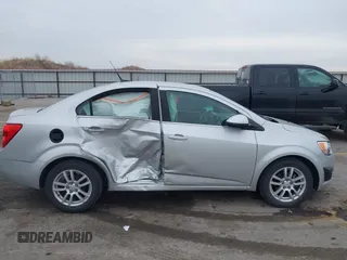 2012 Chevrolet Sonic LT with VIN 1G1JC5SH0C4162034, listed as a IAAI auction lot 41967195 with 87,086 mi miles and . Bid and sale history available at DreamBid. Image 13.