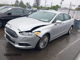 2016 Ford Fusion Titanium with VIN 3FA6P0K91GR360914, listed as a IAAI auction lot 41833665 with 107,367 mi miles and . Bid and sale history available at DreamBid. Image 2.