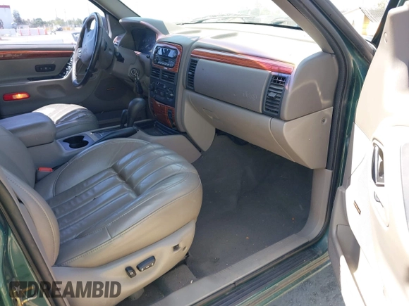 1999 Jeep Grand Cherokee Limited with VIN 1J4GW68N5XC666564, listed as a IAAI auction lot 42117018 with 177,440 mi miles. Bid and sale history available at carsss.com. Image 5.