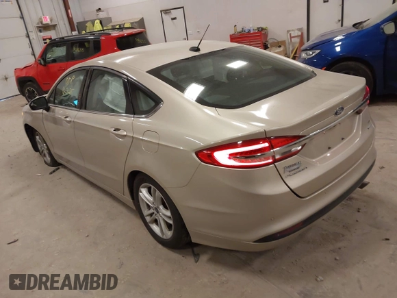 2018 Ford Fusion SE z VIN 3FA6P0HD2JR201693, wystawiony jako IAAI lot #42012709 z przebiegiem 110 857 mil mil oraz . Historia ofert i sprzedaży dostępna na DreamBid. Obrazek 3.