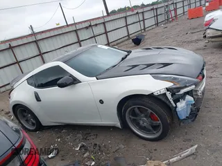 2016 Nissan 370Z Sport z VIN JN1AZ4EH1GM930883, wystawiony jako IAAI lot #41909945 z przebiegiem 80 484 mil mil oraz . Historia ofert i sprzedaży dostępna na DreamBid. Obrazek 14.