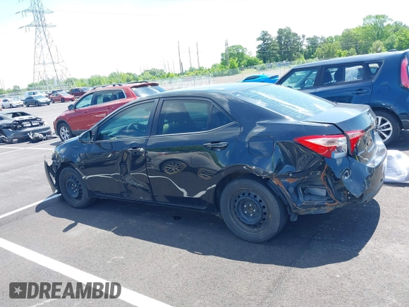 2019 Toyota Corolla L with VIN 5YFBURHE4KP860848, listed as a IAAI auction lot 42167529 with 152,301 mi miles. Bid and sale history available at carsss.com. Image 14.