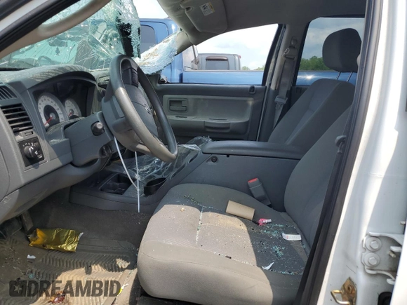 2006 Dodge Dakota SLT z VIN 1D7HW48N76S671886, wystawiony jako Copart lot #59487655 z przebiegiem Nie podano mil oraz Szkoda całkowita • Salvage title. Historia ofert i sprzedaży dostępna na DreamBid. Obrazek 7.