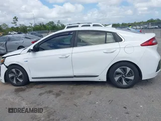 2018 Hyundai Ioniq SEL z VIN KMHC75LC2JU096795, wystawiony jako IAAI lot #42120793 z przebiegiem 111 058 mil mil oraz . Historia ofert i sprzedaży dostępna na DreamBid. Obrazek 14.