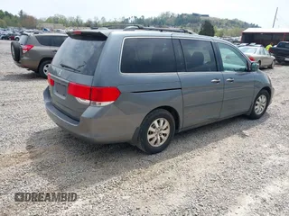 2010 Honda Odyssey EX-L with VIN 5FNRL3H68AB039883, listed as a IAAI auction lot 42000686 with 231,642 mi miles. Bid and sale history available at carsss.com. Image 4.