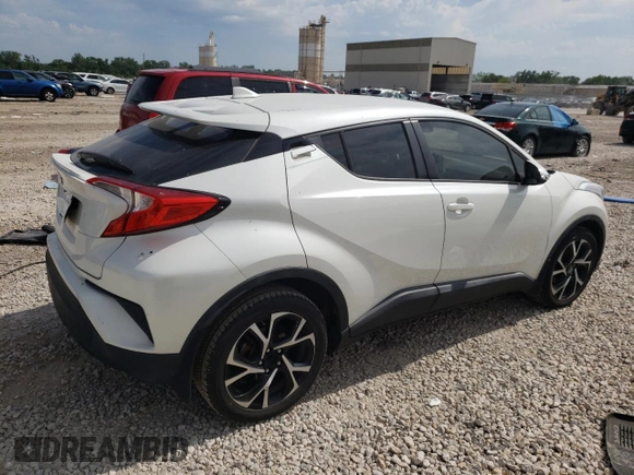 2018 Toyota C-HR XLE with VIN NMTKHMBXXJR041607, listed as a Copart auction lot 60540654 with 84,228 mi miles and Salvage Title. Bid and sale history available at DreamBid. Image 3.