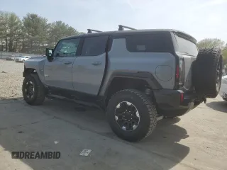 2024 GMC Hummer EV 2X z VIN 1GKB0NDE8RU106525, wystawiony jako Copart lot #54308665 z przebiegiem 4762 mil mil oraz Szkody całkowita. Historia ofert i sprzedaży dostępna na DreamBid. Obrazek 2.