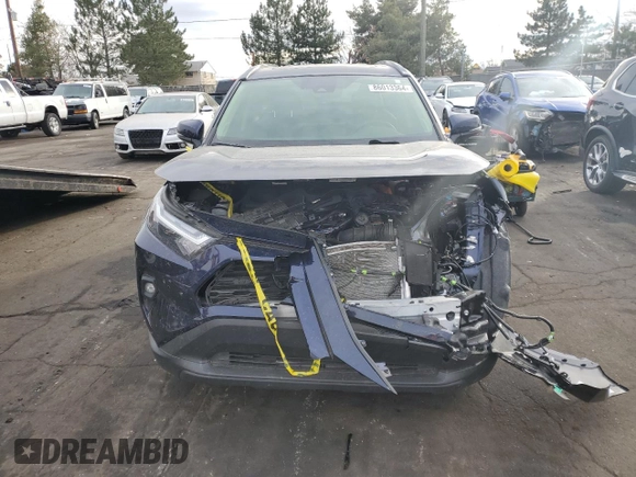 2024 Toyota RAV4 Hybrid XLE Premium with VIN JTMB6RFV4RD137902, listed as a Copart auction lot 86013364 with 9,330 mi miles and Salvage Title. Bid and sale history available at DreamBid. Image 5.