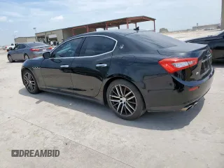 2014 Maserati Ghibli S Q4 with VIN ZAM57RTA8E1097777, listed as a Copart auction lot 59604665 with 86,135 mi miles and Salvage title. Bid and sale history available at DreamBid. Image 2.