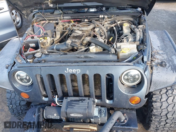 2007 Jeep Wrangler Rubicon with VIN 1J8GA64197L116283, listed as a IAAI auction lot 41008968 with 215,388 mi miles and . Bid and sale history available at DreamBid. Image 10.