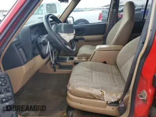2000 Jeep Cherokee Police with VIN 1J4FF48S7YL204028, listed as a Copart auction lot 85516694 with 233,547 mi miles and Salvage Title. Bid and sale history available at carsss.com. Image 7.