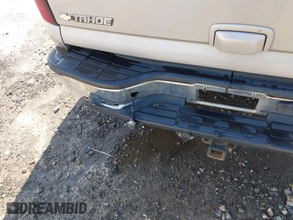 2004 Chevrolet Tahoe LT with VIN 1GNEK13Z64J292910, listed as a IAAI auction lot 42570170 with 309,679 mi miles and . Bid and sale history available at DreamBid. Image 14.