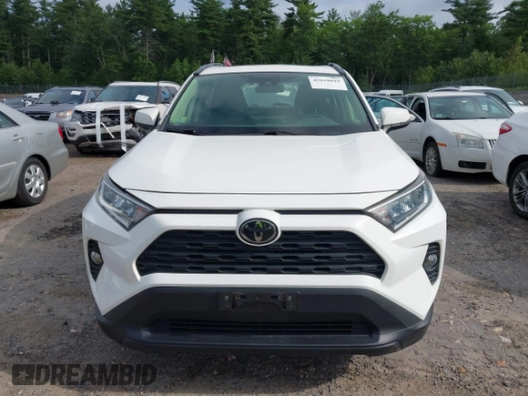 2019 Toyota RAV4 XLE with VIN JTMP1RFV6KD515454, listed as a IAAI auction lot 42618019 with 85,868 mi miles and . Bid and sale history available at DreamBid. Image 12.
