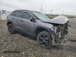 2019 Toyota RAV4 Hybrid XSE with VIN JTMEWRFV3KD517901, listed as a Copart auction lot 57329545 with Not provided miles and Salvage title. Bid and sale history available at DreamBid. Image 4.