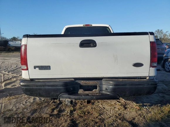 2003 Ford F-250 XL with VIN 1FTNX20L73EC70163, listed as a Copart auction lot 77061204 with 387,321 mi miles and Salvage title. Bid and sale history available at DreamBid. Image 6.