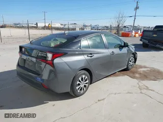2019 Toyota Prius LE with VIN JTDL9RFUXK3012952, listed as a IAAI auction lot 41134169 with 76,125 mi miles. Bid and sale history available at carsss.com. Image 4.