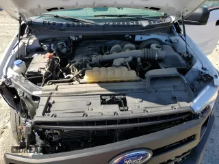 2020 Ford F-150 XL with VIN 1FTMF1CB7LKE33505, listed as a Copart auction lot 48828665 with 100,996 mi miles and Salvage Title. Bid and sale history available at carsss.com. Image 11.