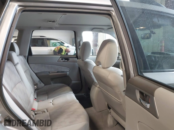 2009 Subaru Forester X with VIN JF2SH63619H731296, listed as a IAAI auction lot 42294036 with 184,739 mi miles and . Bid and sale history available at DreamBid. Image 8.
