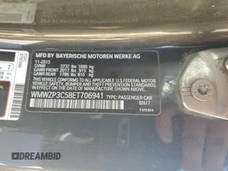 2014 MINI Convertible S with VIN WMWZP3C58ET706941, listed as a Copart auction lot 81900674 with 61,292 mi miles and Salvage title. Bid and sale history available at DreamBid. Image 12.