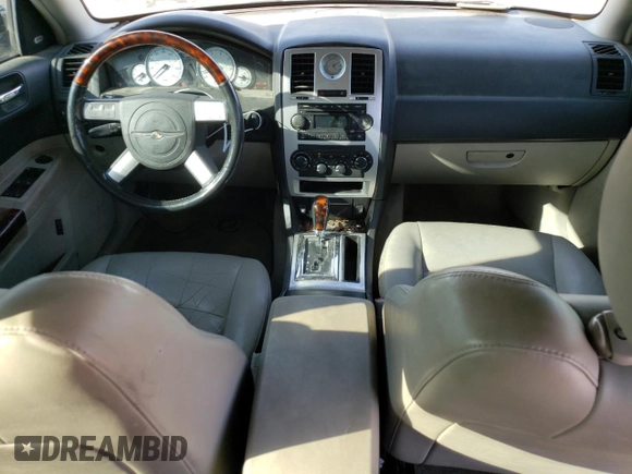 2006 Chrysler 300 C with VIN 2C3KA63H06H272552, listed as a Copart auction lot 72185684 with 105,737 mi miles and Salvage Title. Bid and sale history available at carsss.com. Image 8.