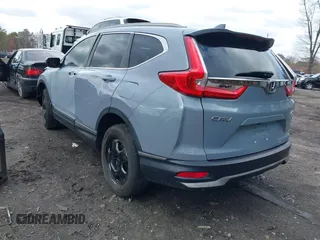 2021 Honda CR-V Touring with VIN 2HKRW2H90MH680172, listed as a IAAI auction lot 41708749 with 26,619 mi miles. Bid and sale history available at carsss.com. Image 3.