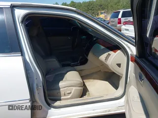 2006 Cadillac DTS w/1SC with VIN 1G6KD57Y36U116528, listed as a IAAI auction lot 42063595 with 128,839 mi miles. Bid and sale history available at carsss.com. Image 5.