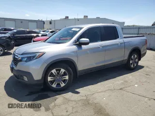 2019 Honda Ridgeline RTL-T with VIN 5FPYK2F66KB003453, listed as a Copart auction lot 57133825 with 42,009 mi miles and Salvage title. Bid and sale history available at DreamBid. Image 1.