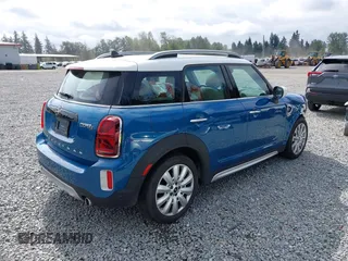 2022 MINI Countryman Cooper S with VIN WMZ83BR0XN3N96765, listed as a IAAI auction lot 42571133 with 22,821 mi miles and . Bid and sale history available at DreamBid. Image 4.