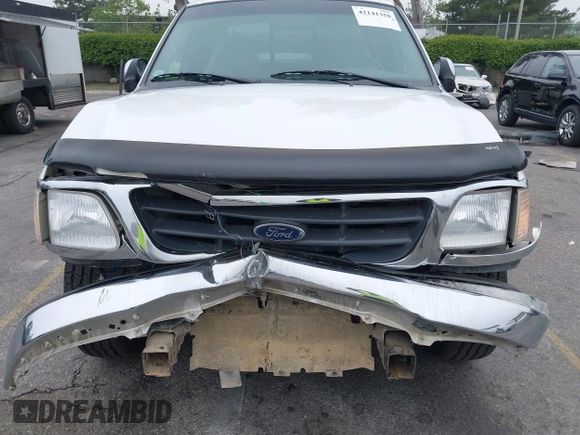 2000 Ford F-150 XL with VIN 1FTRX17L4YNA39407, listed as a IAAI auction lot 42141350 with 82,824 mi miles and . Bid and sale history available at DreamBid. Image 6.